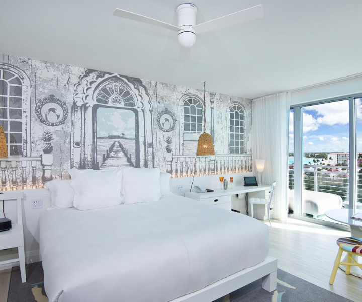 an ornate bedroom with ocean views