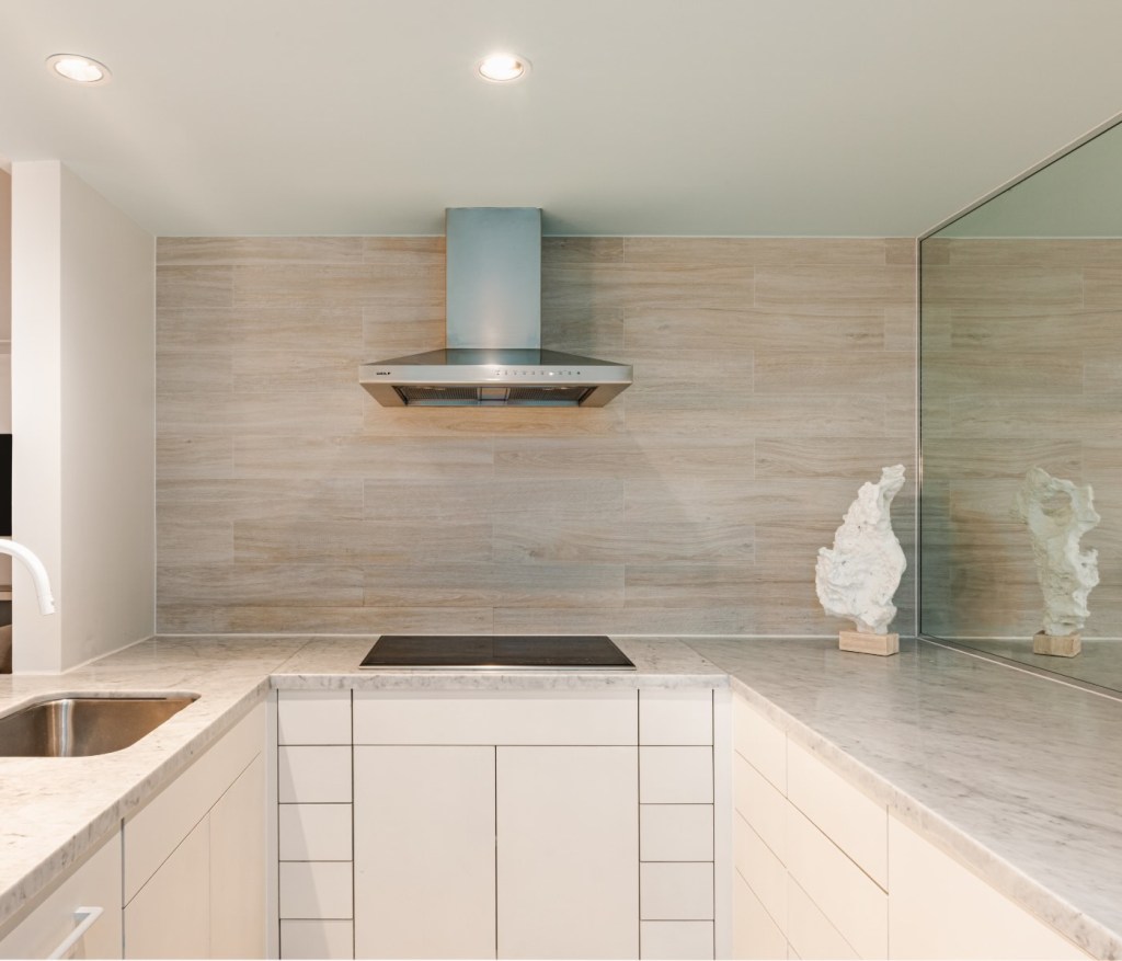 a kitchen with plenty of counter space and a stove