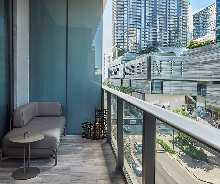 A balcony with views of downtown brickell