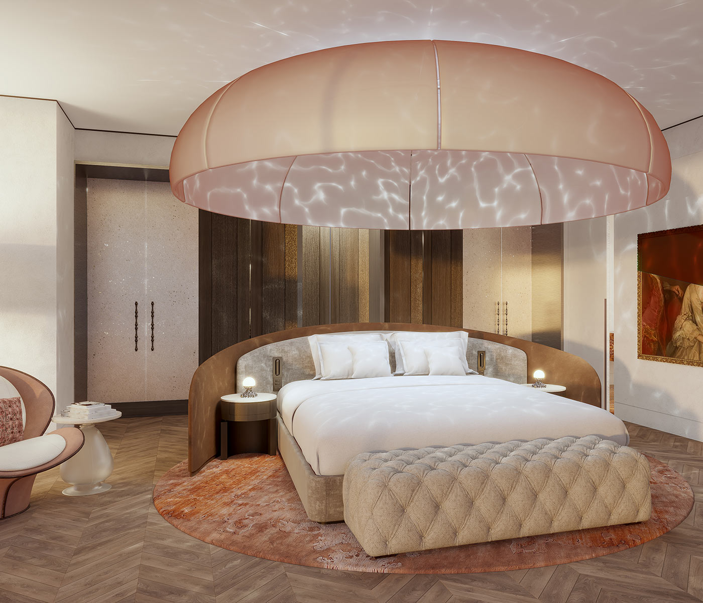 Bedroom in a hotel suite with a large circular lighting fixture hung over the king-size bed, and a tufted bench at the foot of the bed