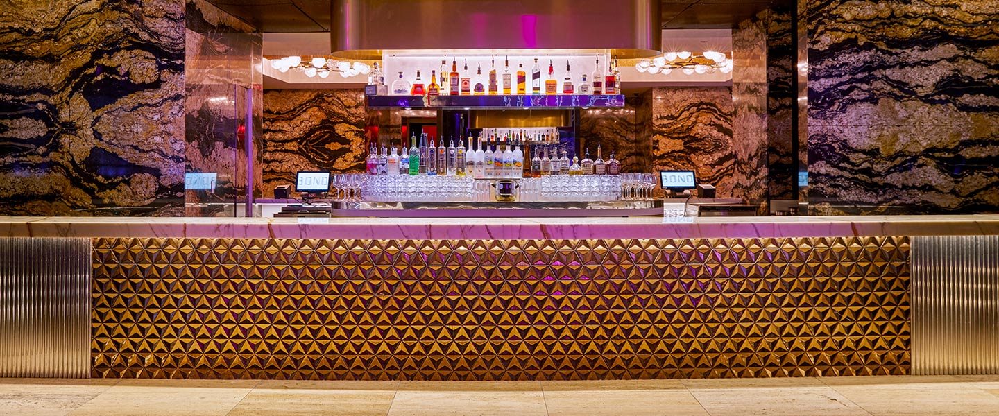 luxurious and glamorous bar with array of alcoholic drinks on display