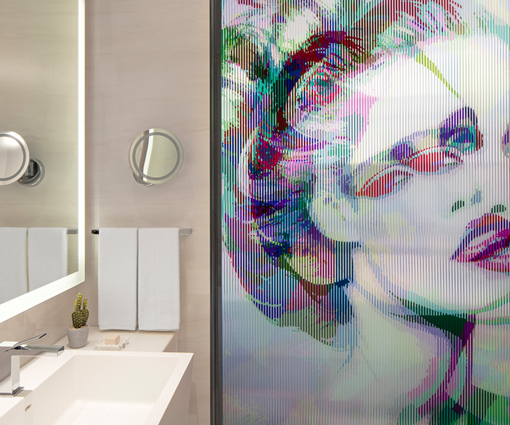 fantastical bathroom with opulent art.