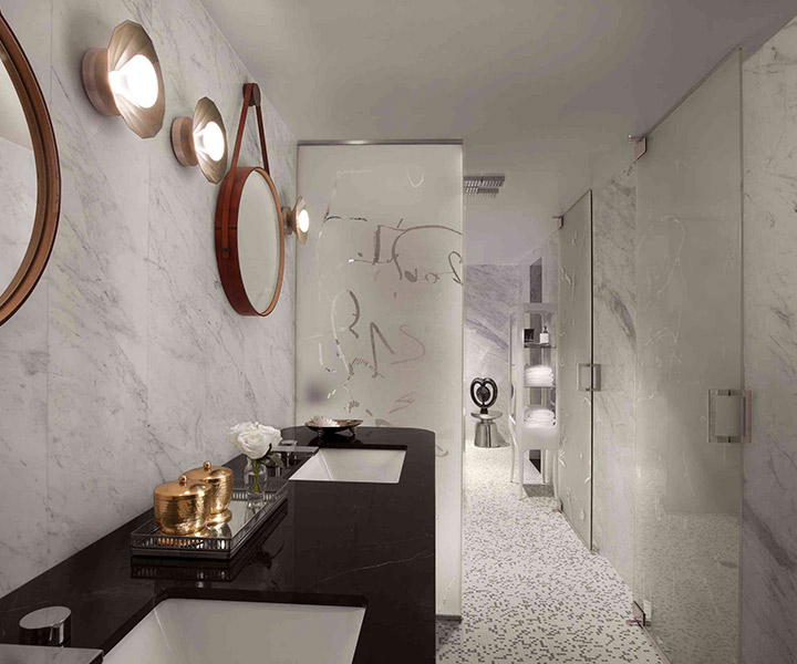 A bathroom with a sleek marble counter top and a sink, exuding elegance and sophistication.