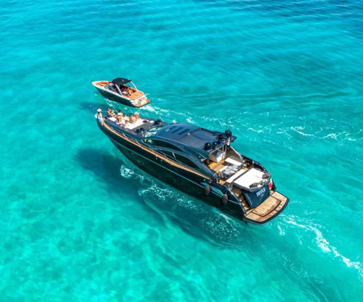 a luxurious yacht on crystal clear blue waters