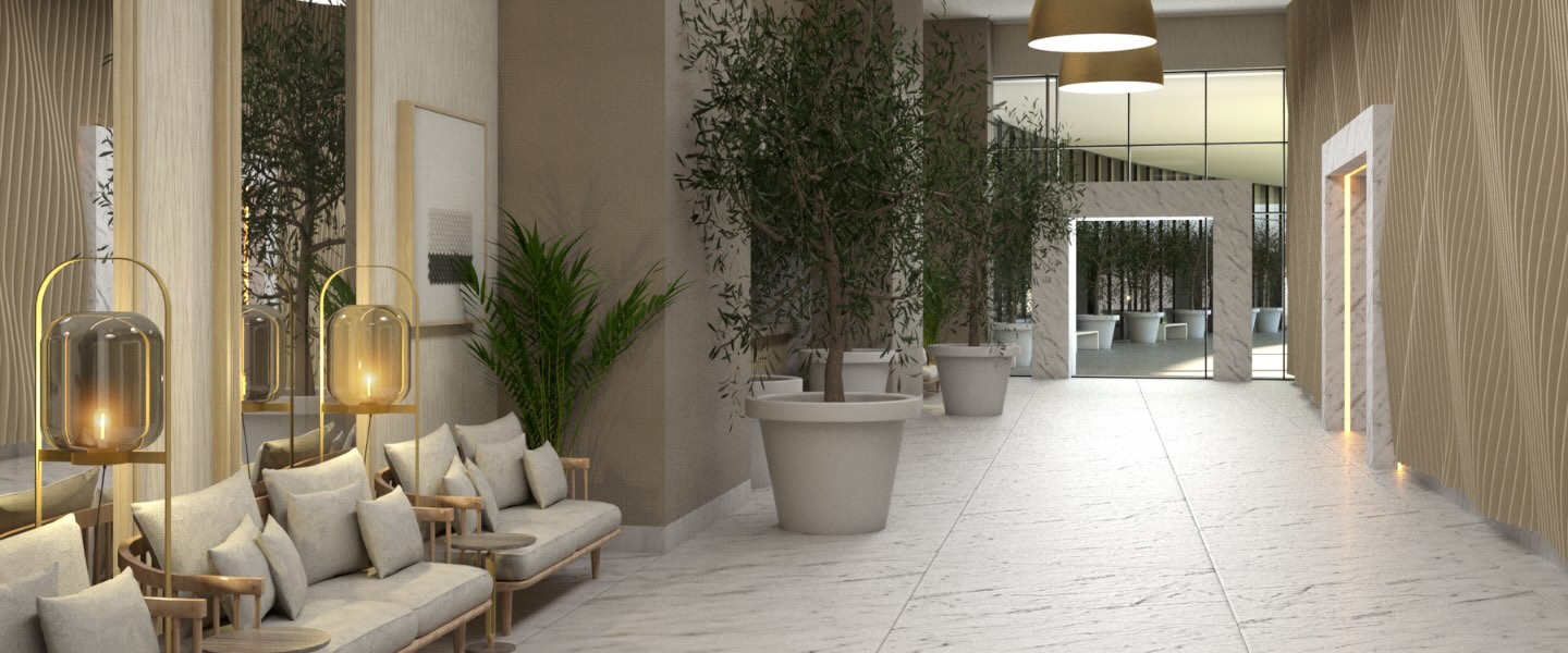 a ballroom foyer with comfortable seating and tall potted plants