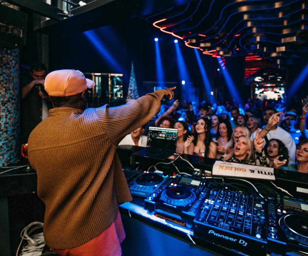 a dj performing at a club