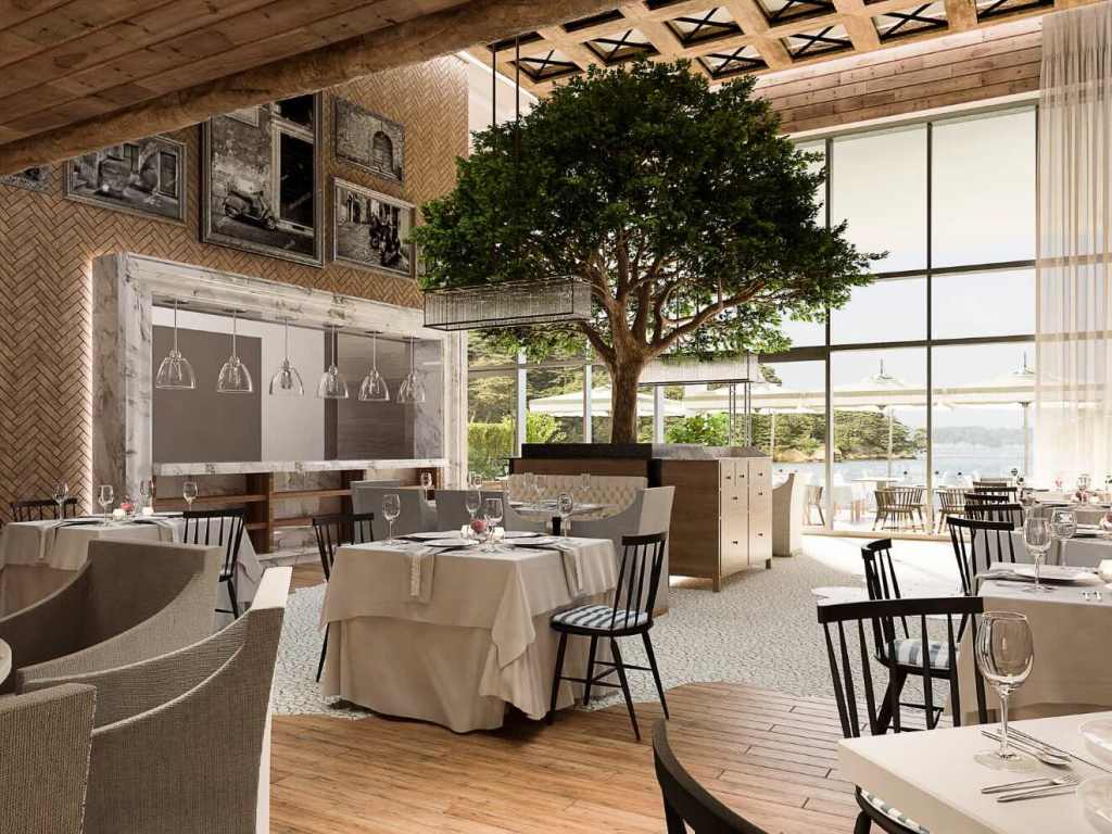 an expansive, naturally lit restaurant with a tree in the middle of the seating area