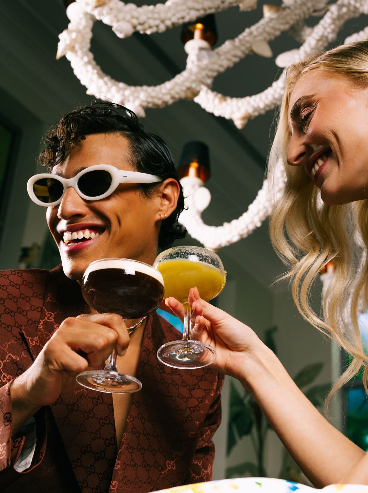 a couple enjoying cocktails at Cartagena 