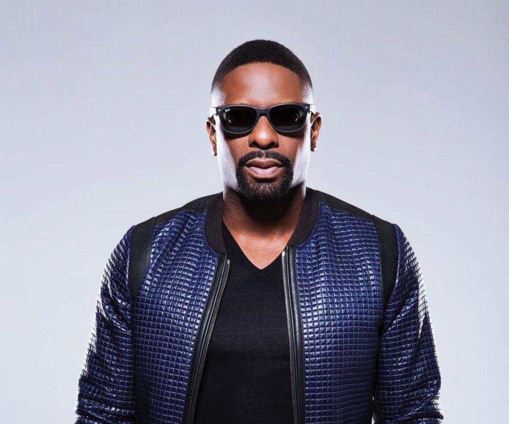 Headshot image of DJ Irie