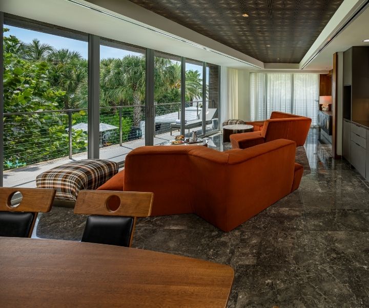 Living room sits in front of a sunny view at the Villa Penthouse