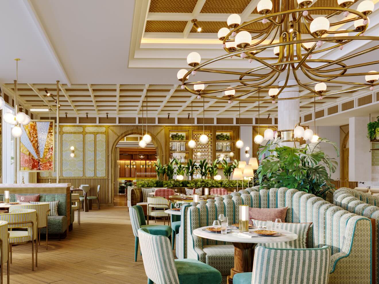 a restaurant space with green booths and chandeliers