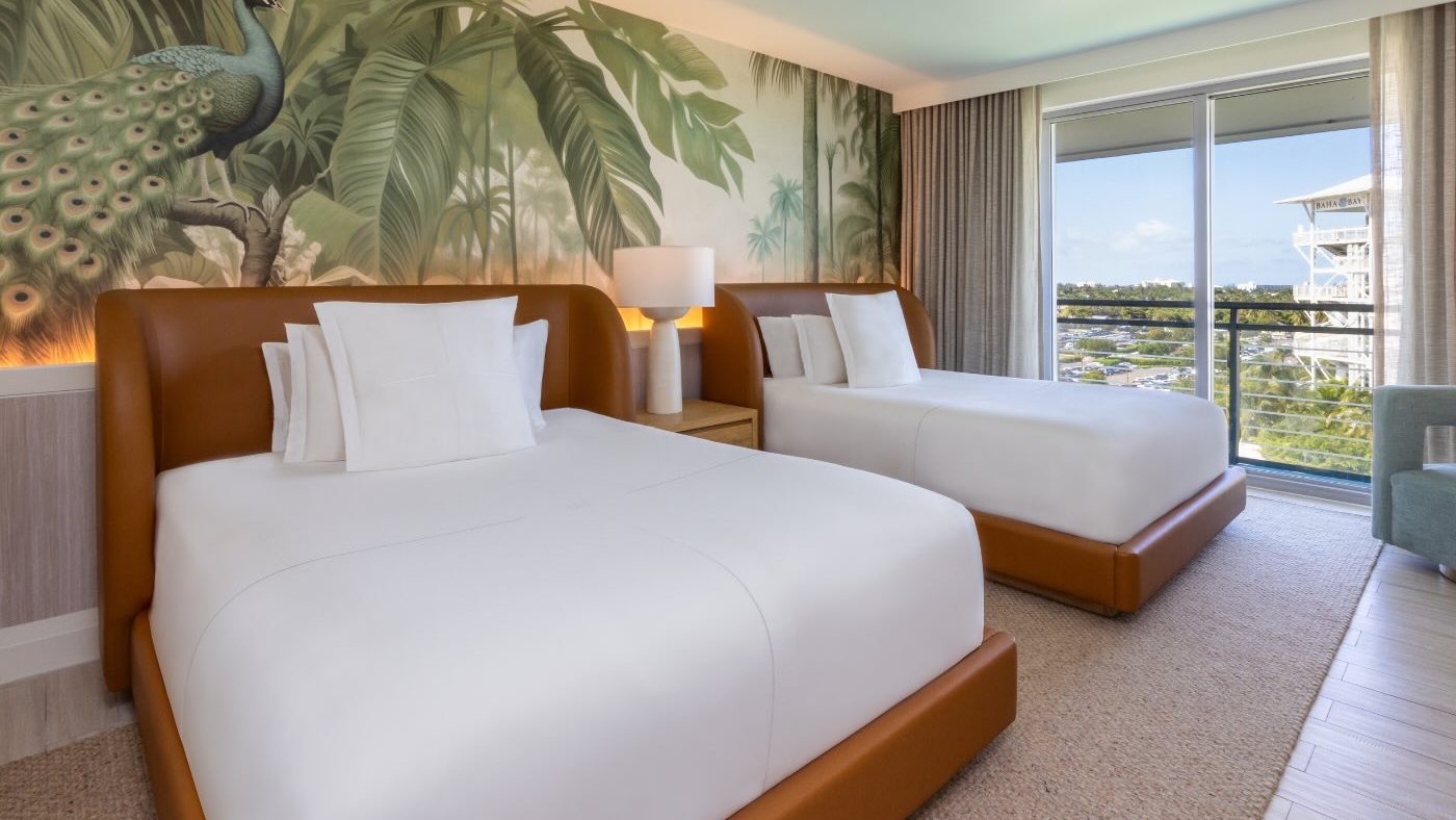 the ocean view two queen room at sls baha mar with two queen beds with leather headboards