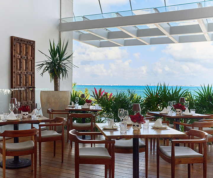 outdoor dining area overlooking Caribbean waters