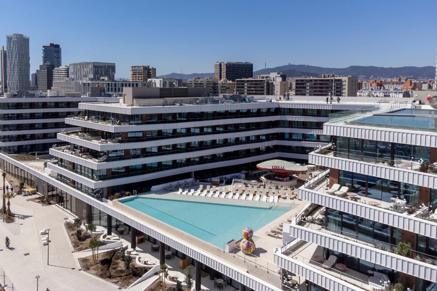 SLS Barcelona located on the boardwalk with a large rooftop pool